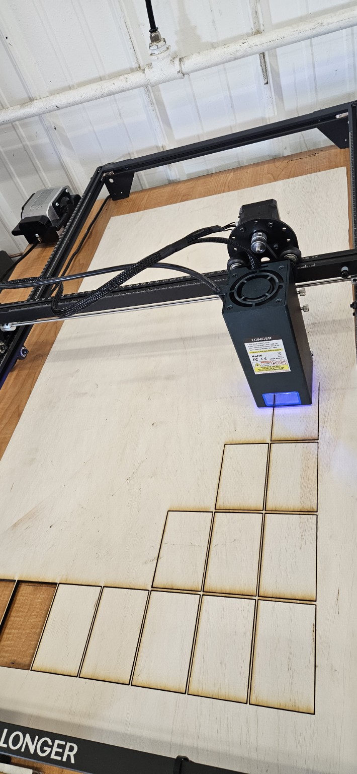 Laser engraving and cutting process in progress